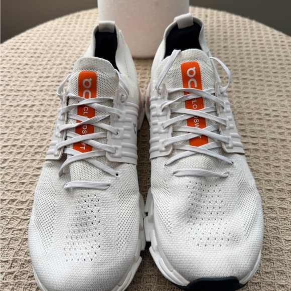 On Cloud Running Sneakers in White with Orange Accents main image 6